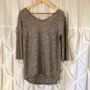 Charming Charlie sweater with lace back detail